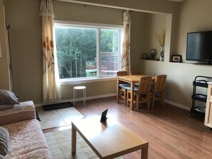 big living area, huge window and view