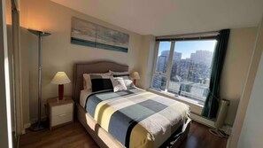 Master bedroom has a high-rise view.