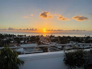 Sunrise over Maspalomas dunes and beach from the terrace. 