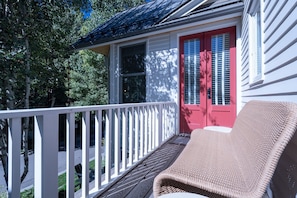 The Primary Bedroom suite features a private deck with stunning views of the mountains.