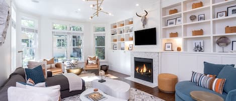 Newly remodeled Living Area with Gas Fireplace for cozy evenings with family and friends.