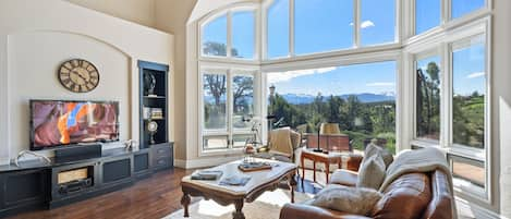 Living Room with Large Windows for Mountain Views and Natural Lighting - TV