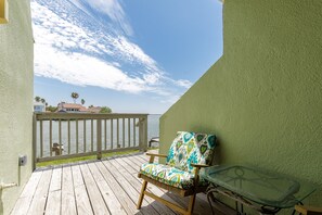 Private patio with access off the living area and master bedroom that over looks the beautiful canal waters
