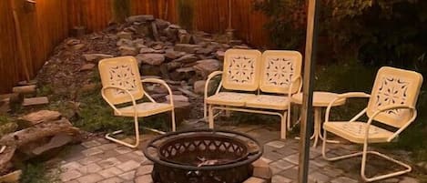 Enjoy the evening under the Big Sky by the fire pit and water feature!