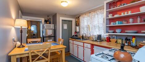 fully featured kitchen with provided coffee, tea, and cocoa