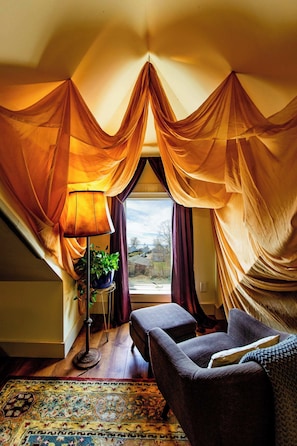 Comfortable nook with a view for morning tea or reading on a rainy day