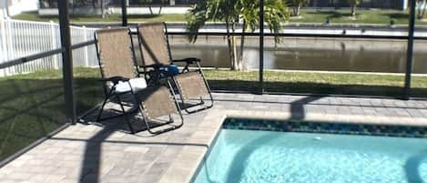 Relax poolside while soaking up the Florida sun