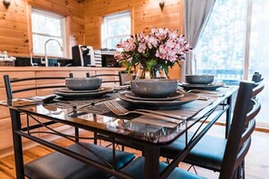 Beautifully decorated dining table with wine glasses for intimate dinners