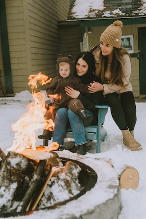 Embrace the warmth and charm of the Sunset Chalet. Gather around the firepit with loved ones, enjoying cozy moments in the snow, making unforgettable memories. A perfect retreat for relaxation and connection with nature.