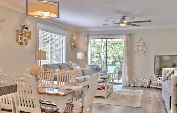 Our dining table is conveniently located near the kitchen and living room