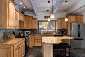 Main level kitchen, living and dining space