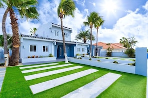 The outdoor landscape with well painted facade and trees