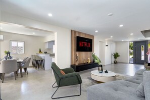 A very spacious and open concept living-dining area that is perfect for your large group and families.