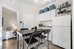 Kitchen is stocked with basic cooking and dining amenities, great for short or long stays.