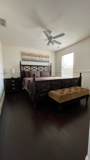 Guest Bedroom on the 2nd flr features a King Bedroom and lake views. 