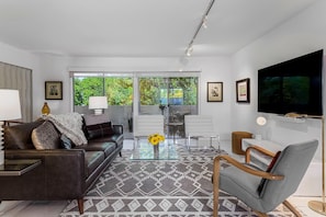 Spacious living room with direct access to 40 ft. balcony