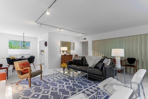 Open floor plan, shown with accordion wall closed to guest bedroom