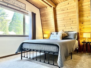 Master bedroom with new, comfortable, queen size bed.