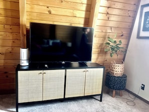 55” smart Tv in master bedroom perfect to watch movies with your favorite person