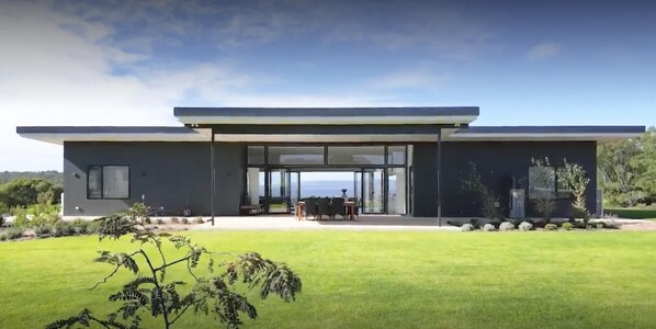 Stunning inlet views through the property, from the back yard to front deck.
