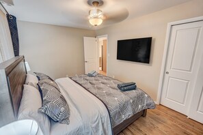 Master Bedroom with exquisite 55-Inch Smart TV. 