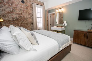 Experience ultimate comfort and luxury with a spacious king bed 