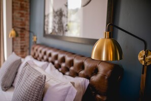 Elegant King Suite featuring a plush king-sized bed, separate living area, and premium amenities for a luxurious and relaxing stay.