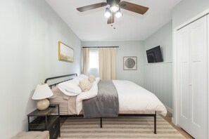 Rest up in this large king bed on the lower level