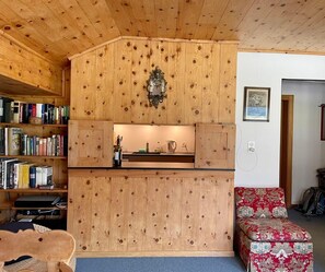 View from the dining table towards the kitchen (opening can be closed)