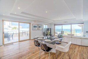 Bright and light filled open plan dining & living room with two balconies.