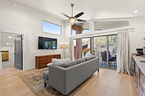 Master Suite 1- Seating Area with sofa, tv, balcony, wet bar, and mini fridge (upstairs)