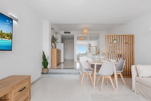 Modern and bright space that has a main bed and a sofa bed in the living room. (1)