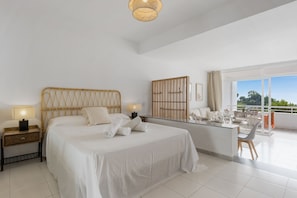Modern and bright space that has a main bed and a sofa bed in the living room. (2)
