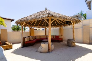 Gazebo lounge area- chill and give yourself a break on the shade of the gazebo. Take time to enjoy the view of the villa from the outside