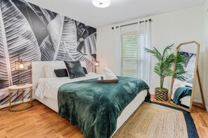 Relax in the uniquely curated design of the queen bedroom w/ a 40" Roku TV.