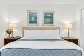 This luxurious master suite has a king bed, with a high upholstered headboard, and outstanding views of the canal from the oversized window. There is an armchair, and a walk-in closet, a smart LED TV with cable, and safe for personal items.