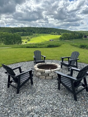 Fire pit with adirondack chairs