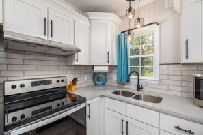 This fully stocked kitchen has everything you need to prepare your meals.