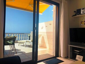 Sliding patio doors from our living room to our large sunny terrace