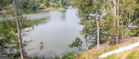 Stunning lake view from the screened-in porch. 