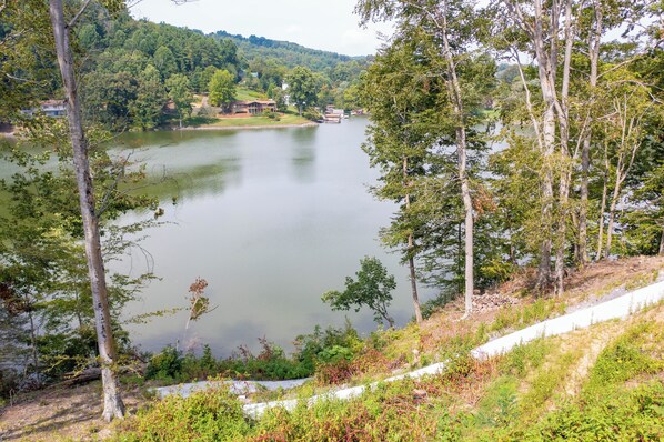 Stunning lake view from the screened-in porch. 