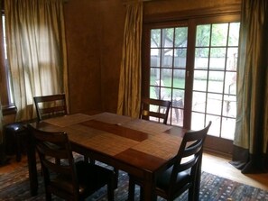 Main Floor - Dining Room w/View to Patio, and Sliding Glass Door (Seats 6)