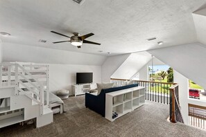 "Bright and airy loft with stunning views, cozy seating, and stylish decor!