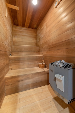 Welcome to luxury living at its finest. Our master en-suite boasts a full sauna, providing the epitome of relaxation and rejuvenation right at your fingertips. Experience unparalleled comfort and opulence in every moment of your stay.