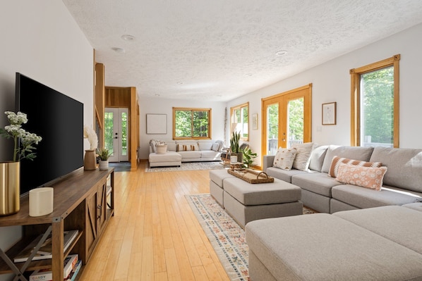 Just lounging on this cozy couch in a beautiful wood-floored living room. Love the peaceful vibes! #CozyLiving