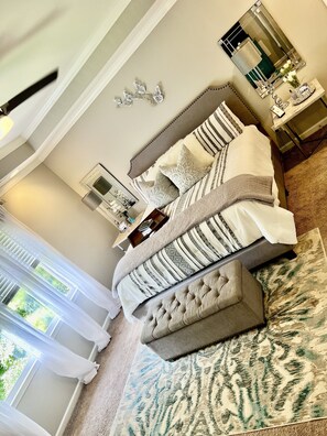 Master King Bedroom with En Suite Bath & 32-inch Roku TV.
