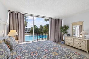 Master Bedroom Overlooking One Of Three Swimming Pools