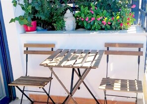 Additional table and chairs on the balcony with sea views