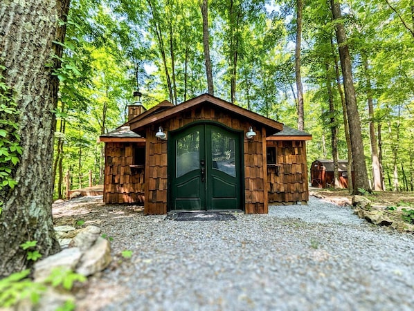 The cabin is a very unique tiny home with the charm of a fairytale.