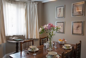 The dining area, with seating for four guests